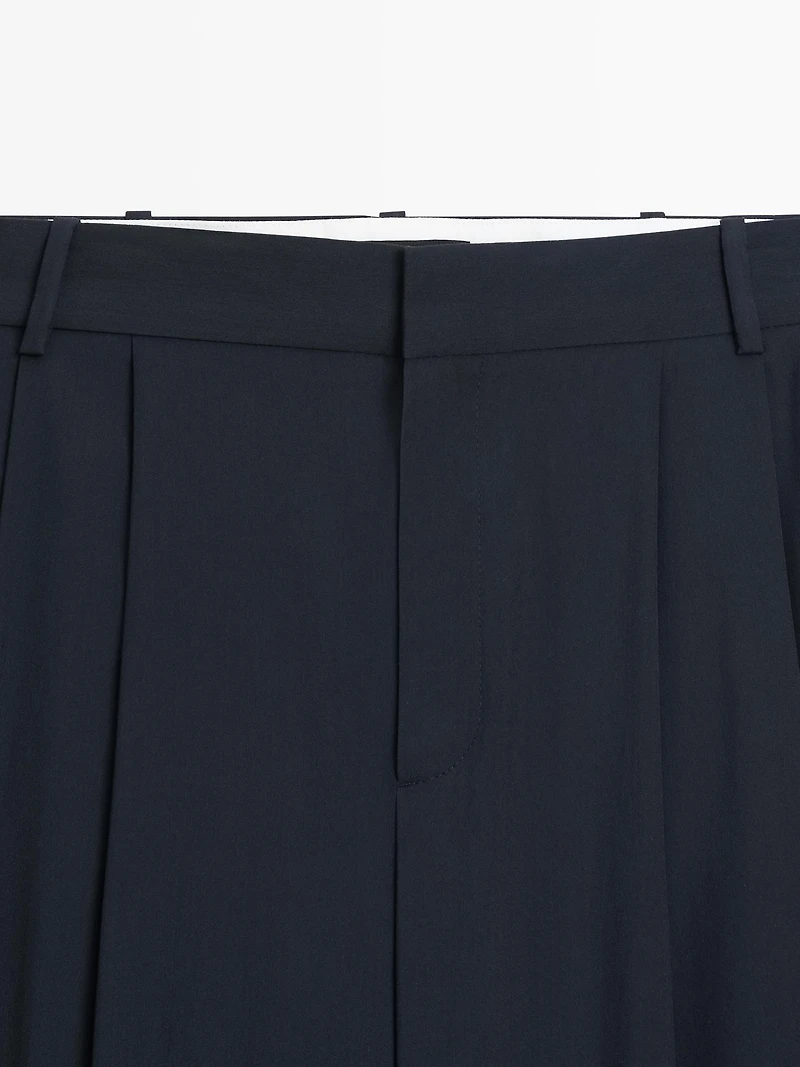 Pleated wool blend trousers