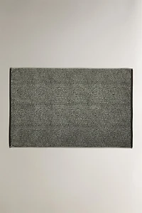 MELANGE-EFFECT BATH MAT