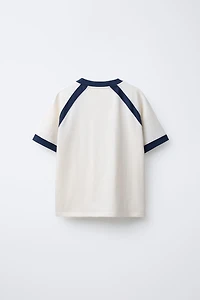 FLOCKED TEXT RAGLAN SLEEVE T-SHIRT