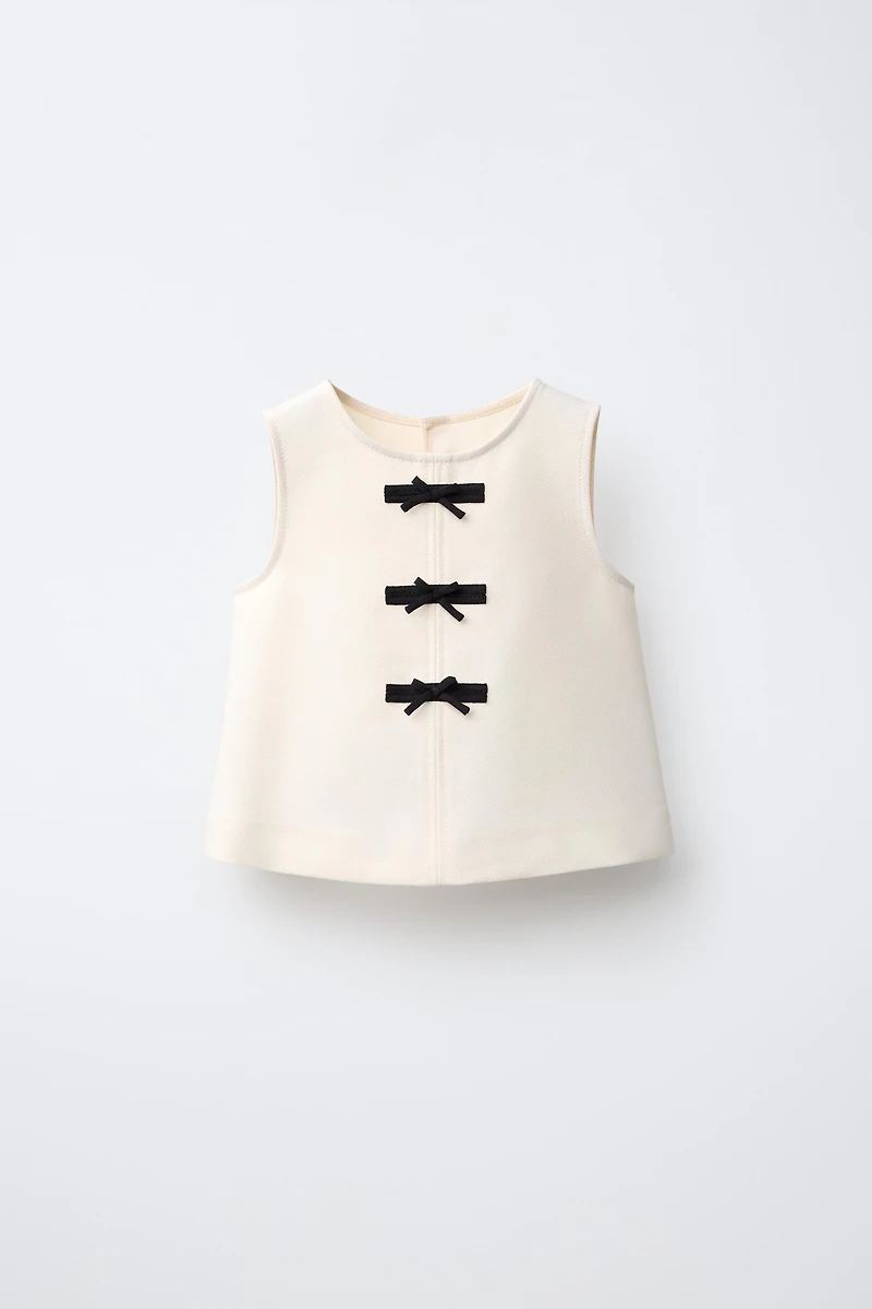 BOW APPLIQUÉ TOP