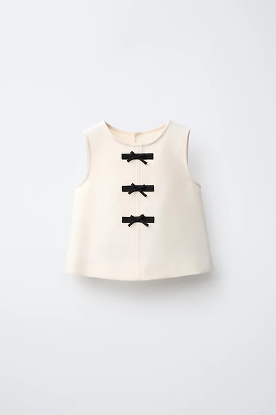BOW APPLIQUÉ TOP