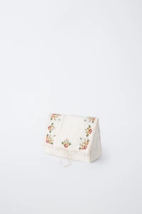 EMBROIDERED TOILETRY BAG