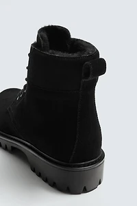 BOTTES EN CUIR À LACETS