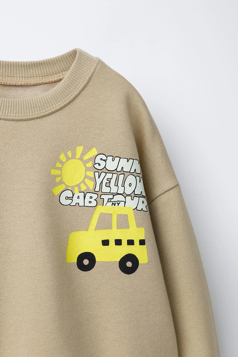 TAXI PRINT SWEATSHIRT