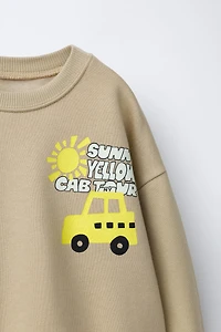 TAXI PRINT SWEATSHIRT