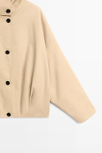 Pleated stand-collar bomber jacket
