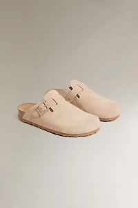 SABOTS EN CUIR BOUCLE