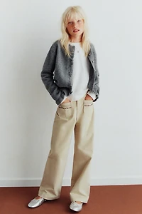 GILET EN MAILLE VOLANTS AVEC LAINE