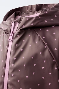 WATER-RESISTANT HEART PRINT RUBBERIZED RAINCOAT