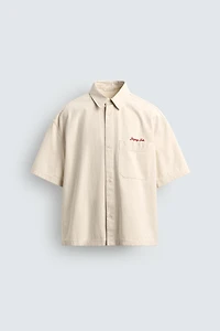 PLAID SHIRT WITH EMBROIDERED TEXT