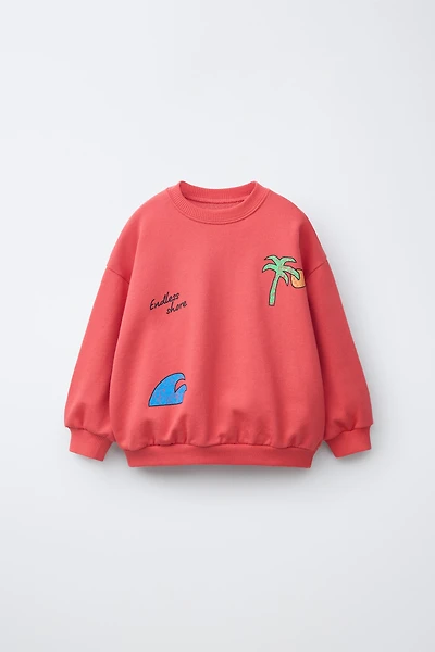 SWEAT IMPRIMÉ PALMIER