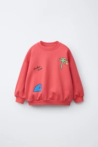 SWEAT IMPRIMÉ PALMIER