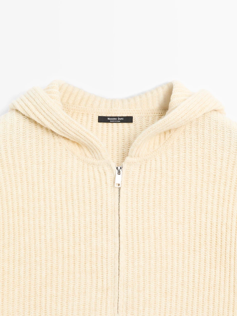 Wool blend sweater with hood detail