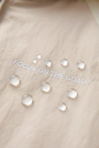 LIGHTWEIGHT COLORBLOCK WATER REPELLENT RAINCOAT