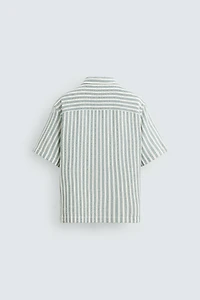 CHEMISE POLO STRUCTURÉE À CHEVRONS