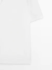 Textured knit short sleeve polo shirt