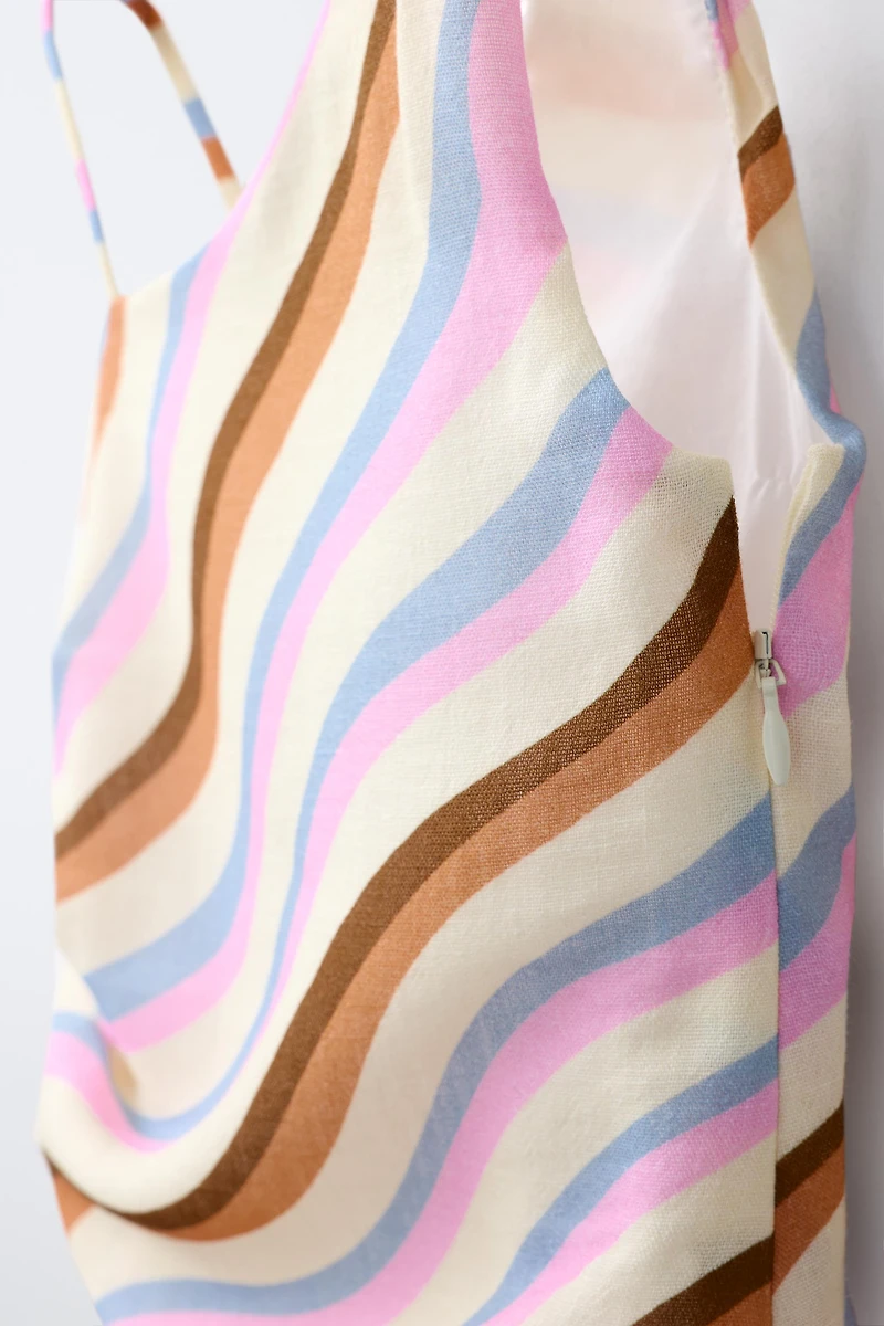 ASYMMETRIC WAVE TOP