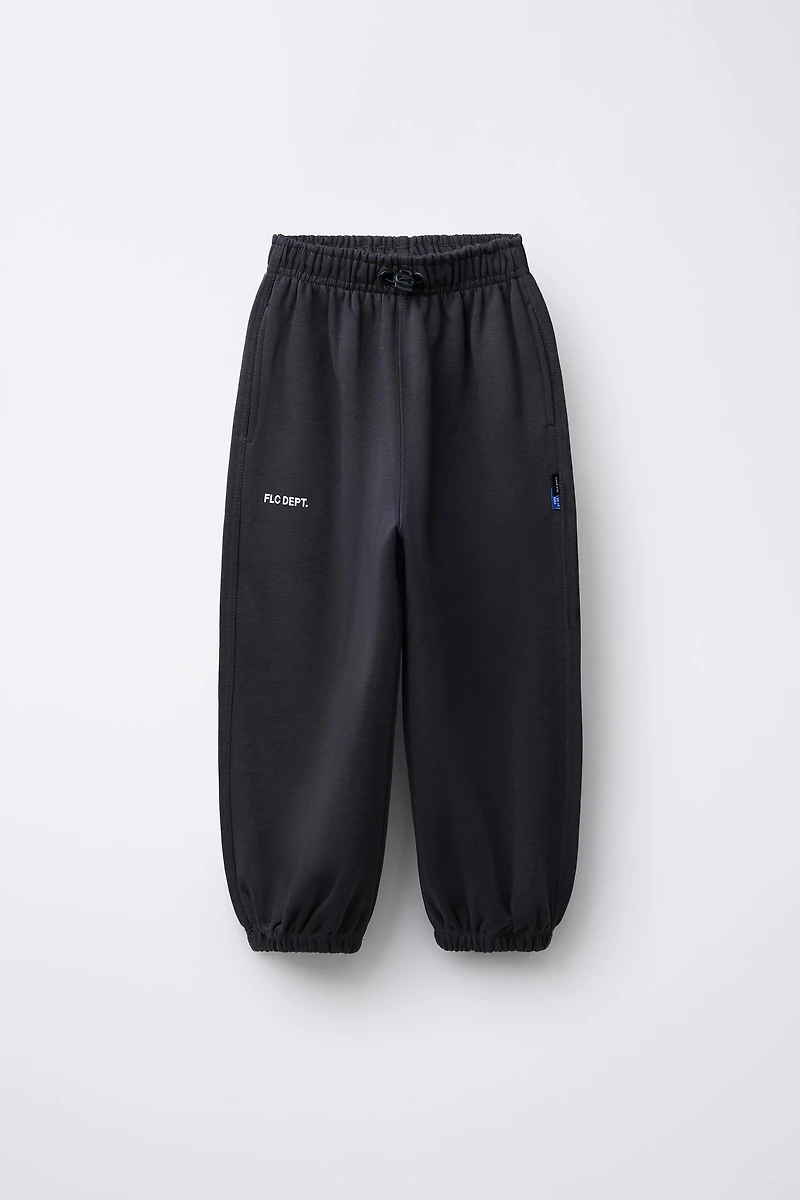 BALLOON PLUSH PANTS WITH TEXT