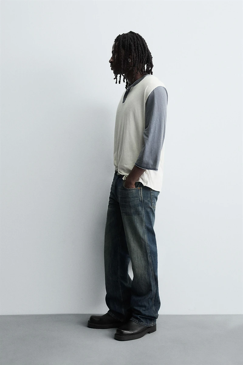 LOW RISE FLARE FIT JEANS