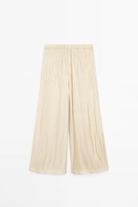 Pantalon fluide en tissu satiné