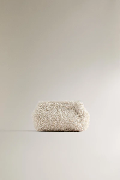 FAUX FUR MAKEUP BAG