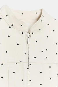VESTE CINTREE À POIS
