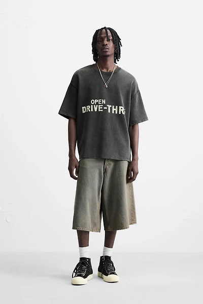 WASHED SWEATSHIRT WITH GRAPHIC PRINTS