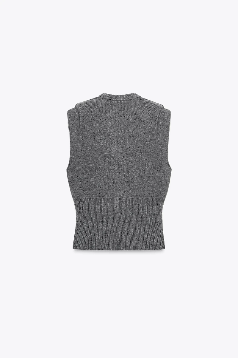 TOP GILET EN MAILLE PLIS ÉPAULE AVEC LAINE