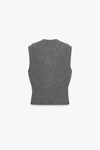 TOP GILET EN MAILLE PLIS ÉPAULE AVEC LAINE