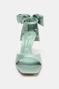 MAXI BOW HEELED SANDALS