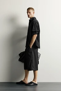 WIDE FIT PLEATED BERMUDA SHORTS