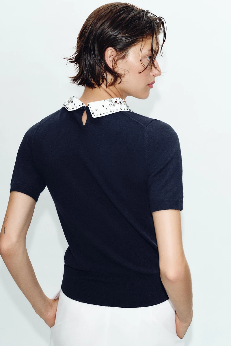 POLO EN MAILLE À FANTAISIE BIJOUX