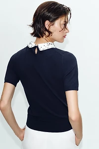 POLO EN MAILLE À FANTAISIE BIJOUX