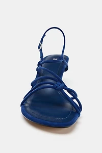 LEATHER HEELED SANDALS WITH KNOTS