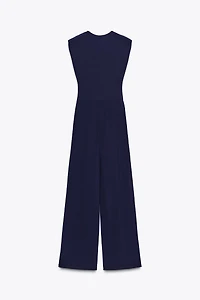 LONG DRAPED SHOULDER PAD JUMPSUIT