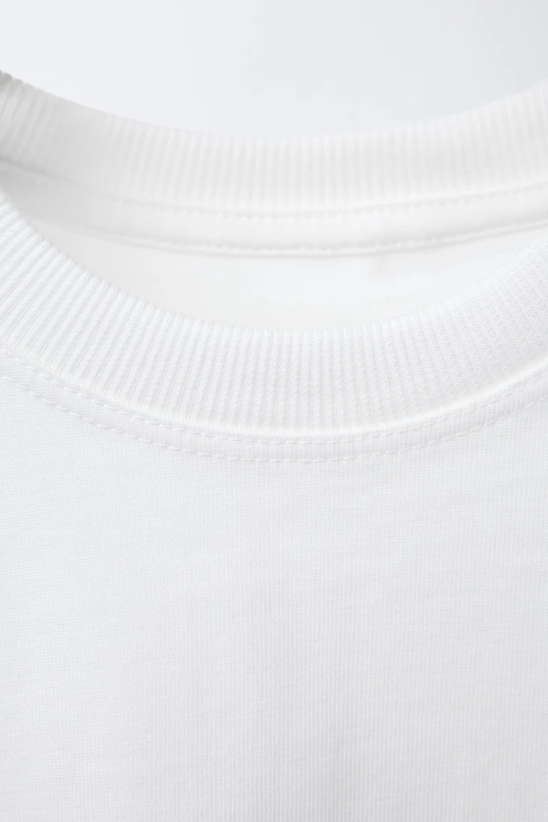 T-SHIRT UNI À POCHE