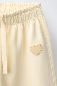 RUBBERIZED HEART INTERLOCK BARREL PANTS