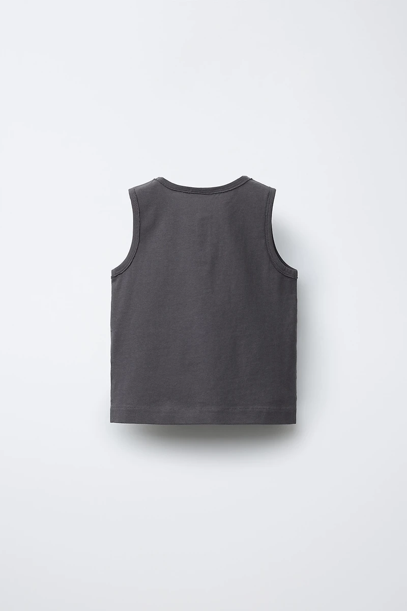 T-SHIRT SANS MANCHES BOUTONS