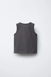T-SHIRT SANS MANCHES BOUTONS