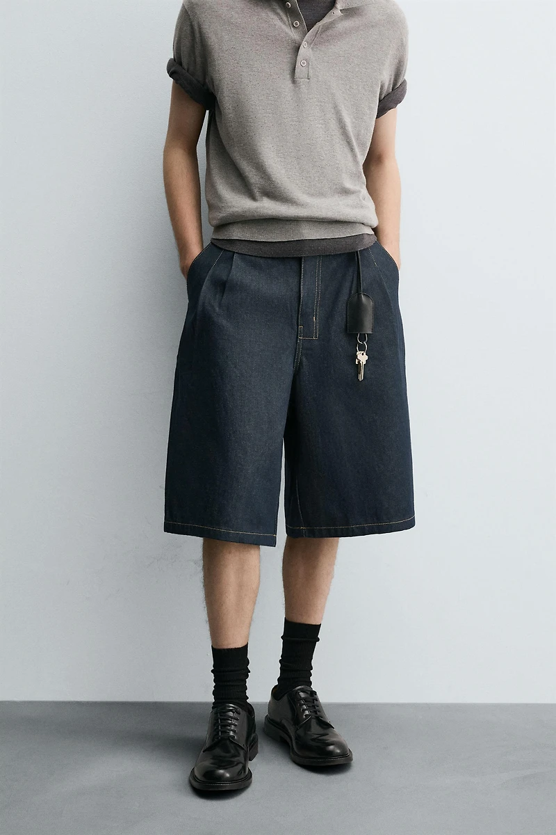 RELAXED FIT PLEATED DENIM SHORTS