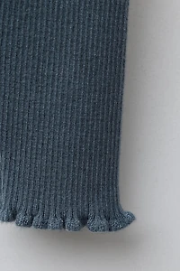 LEGGING EN MAILLE À NŒUD