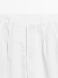 Balloon fit trousers with double darts