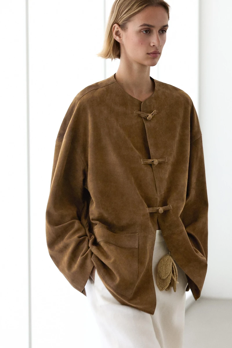 Veste à col officier en cuir finition daim