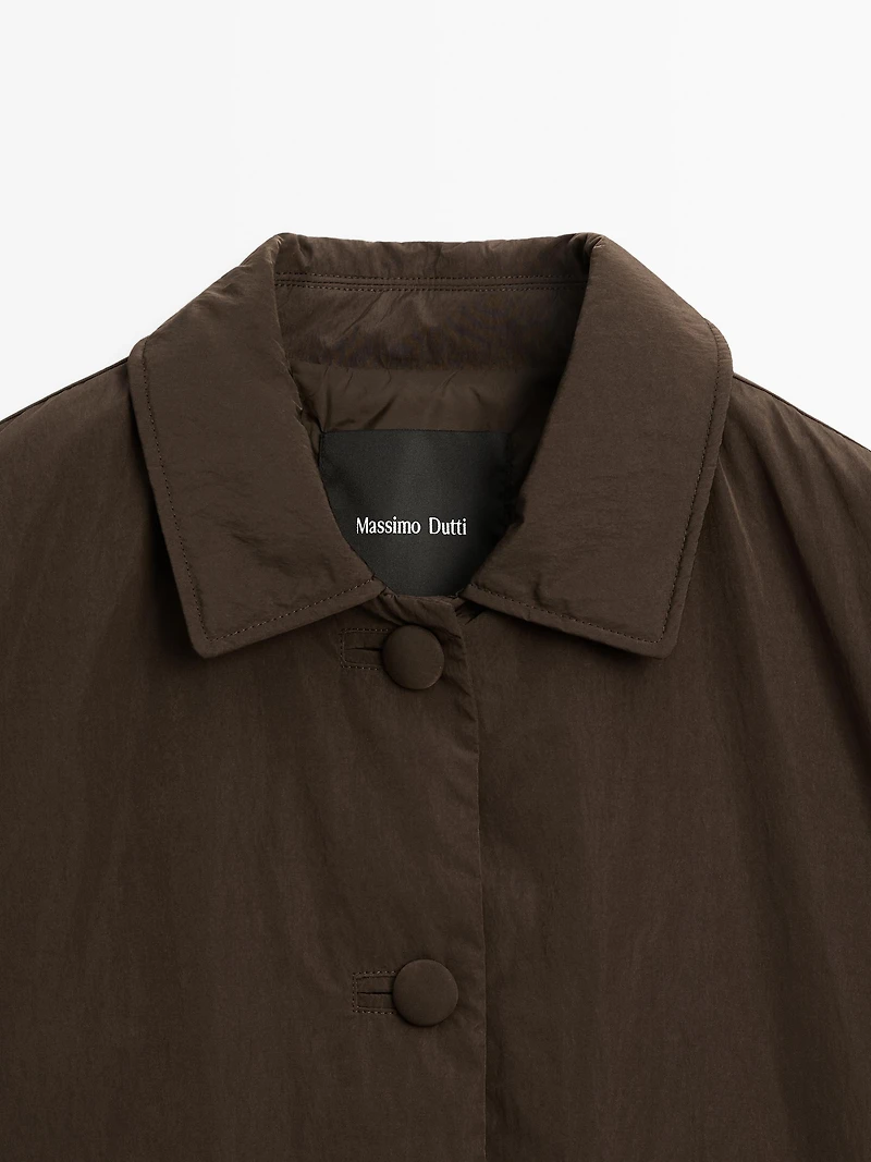 Cropped puffer jacket with covered buttons