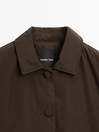 Cropped puffer jacket with covered buttons