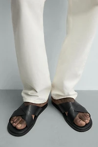 CROSSED SANDALS