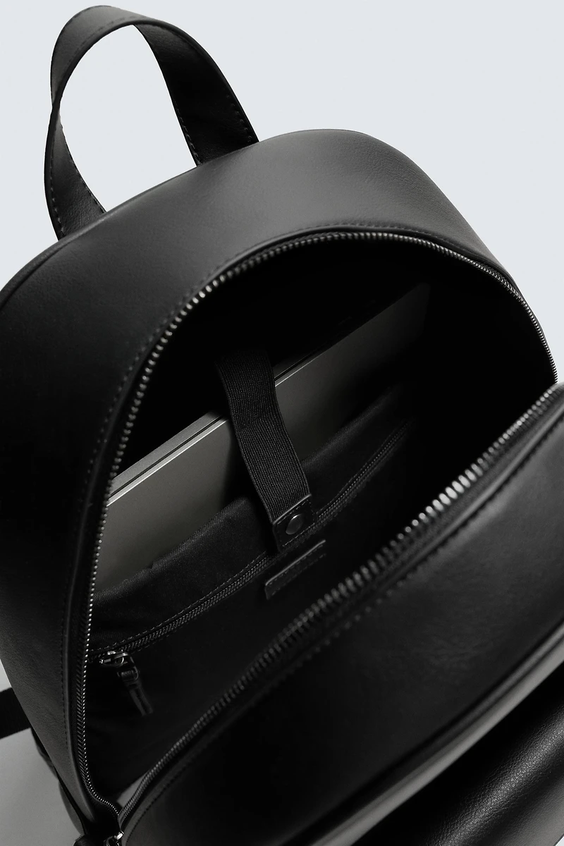 FLAP POCKET BACKPACK