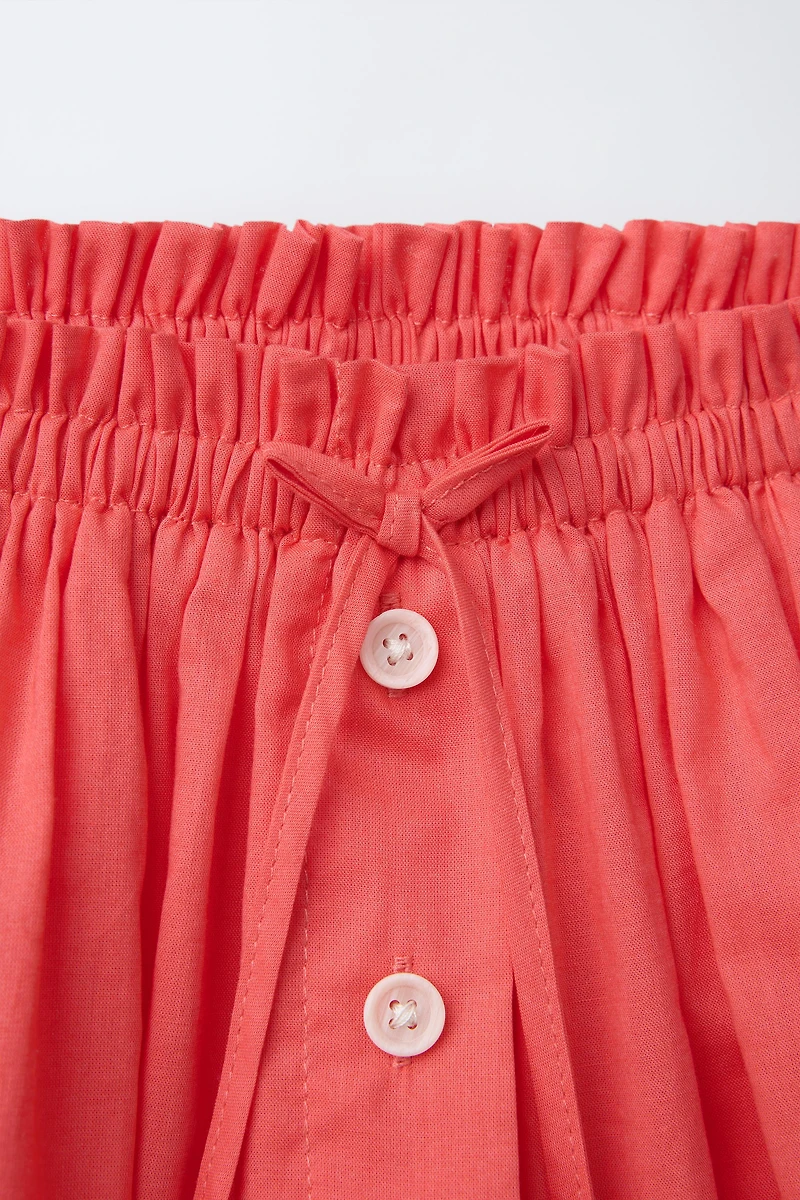 BUTTON SKORT