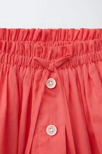 BUTTON SKORT