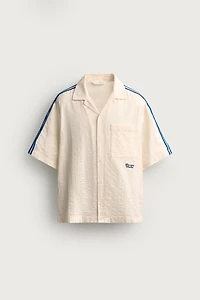 CHEMISE À BANDES AVEC BRODERIE EN CONTRASTE